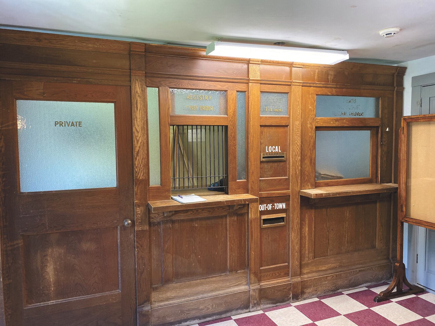 In 1953, the post office interior was removed, intact, from the corner building, where it had been located for years. Today, it is a favorite exhibit on the museum’s second floor.
